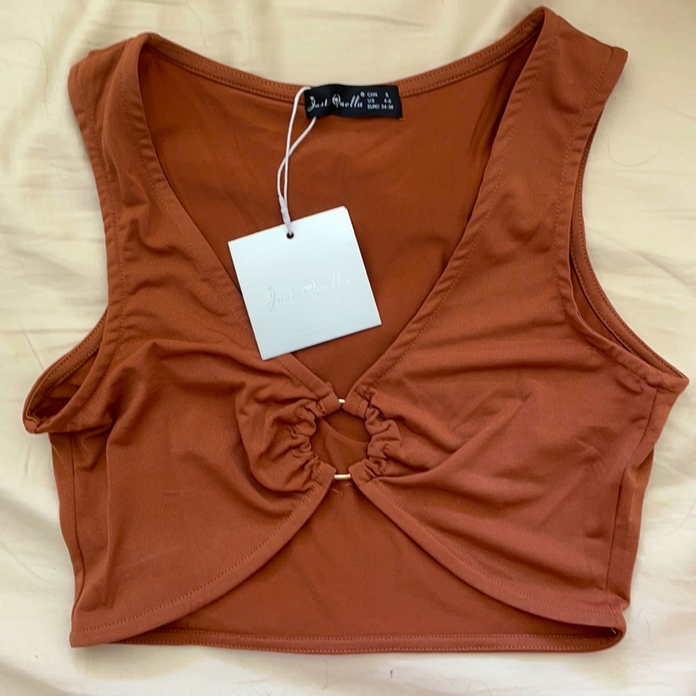 A Just Quella crop top. Size 4-6.